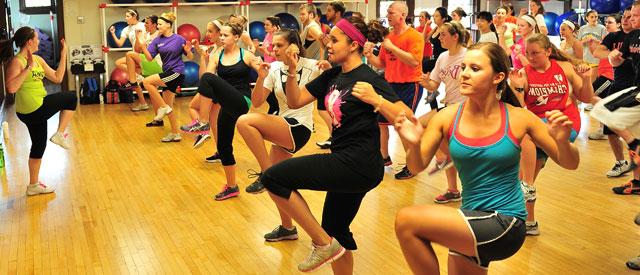 large group of students in a Zumba class